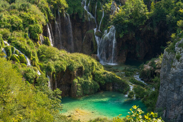 Plitvice Lakes, Croatia - August 16, 2025: Scenic landscape of turquoise lakes and waterfalls in National Park. © ShapikMedia