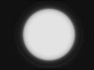 Fototapeta premium A singular, luminous void punches through the profound darkness, a stark, brilliant gaze that warps the edges of reality, as if peering through the very eye of existence itself.