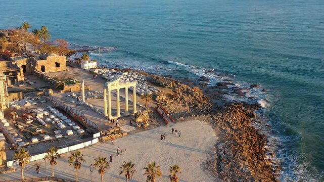 Side, T&uuml;rkiye, aerial view of the waterfront, yacht marina and Temple of Apollo at sunset.