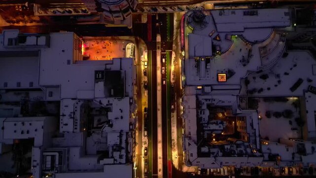 Berlin Steglitz shopping street Snow winter evening. Amazing aerial view drone