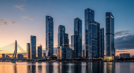 Obraz premium Modern city skyline at sunset tall buildings reflecting in water