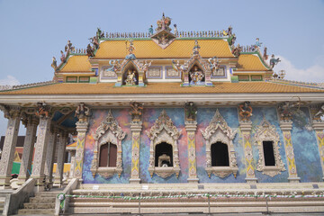 Roof of the ordination hall at Wat Pariwat Ratchasongkram incorporates contemporary art into its decoration , Bangkok city in Thailand.