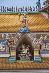 Roof of the ordination hall at Wat Pariwat Ratchasongkram incorporates contemporary art into its decoration , Bangkok city in Thailand.