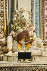 Contemporary stucco art decorative elements in the ordination hall of Wat Pariwat Ratchasongkhram incorporate concepts related to Buddhist beliefs, philosophy, and the past lives of the Buddha.Bangkok