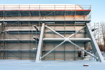Construction Scaffolding and Steel Support Structure Covered with Snow