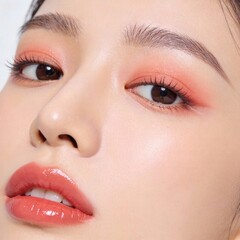 Beautiful woman with natural makeup and glossy lips