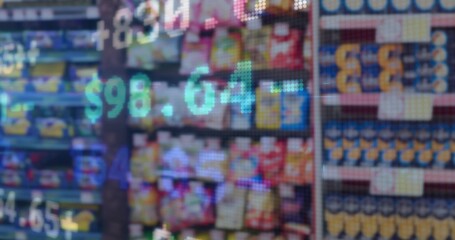 Naklejka premium Displaying grocery snack shelving showing pixelated digital price overlay over product rows, cans