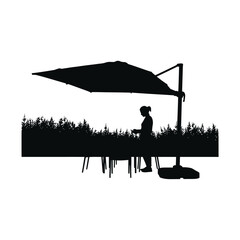 Person relaxing under an umbrella on a sunny day