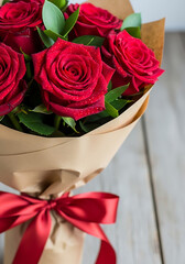Vibrant Dewy Red Roses Gift Wrapped with Luxurious Ribbon