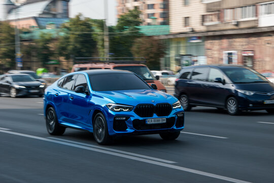 Ukraine, Kyiv - 16 Jule 2021: Light Blue BMW X4 M car moving on the street. Editorial