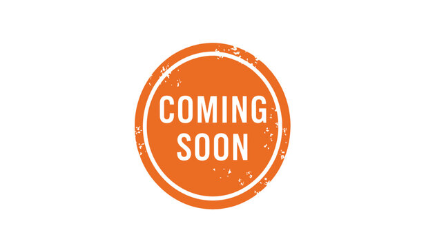 A circular orange sign with white text reading coming soon