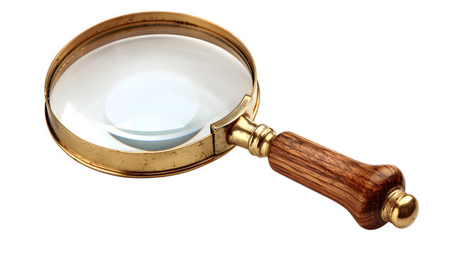 Vintage brass magnifying glass with wooden handle isolated