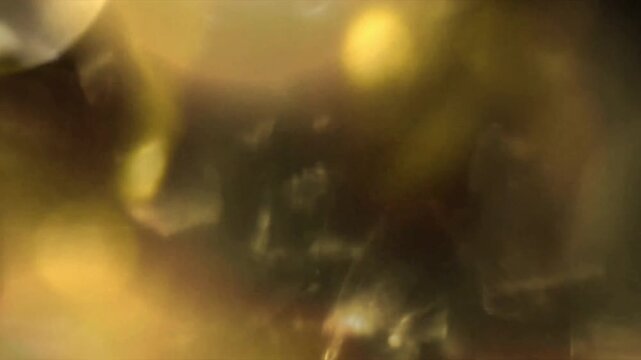 Light organic leaks effect background animation stock footage. Lens light leaks flashing around making an elegant abstract background animation. Classic Light Leak in 4k 