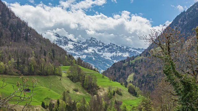 Time lapse, clouds passing over mountains covered with snow. Nuenalphorn mountain peak. Canton of Nidwalden, Obwalden, Switzerland