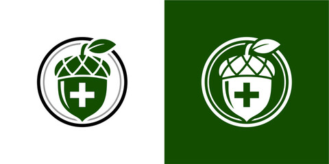 Green acorn logo with a white... © dwi