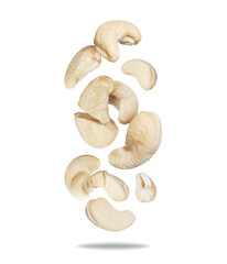 Dried cracked and whole cashew nuts in the air isolated on white background
