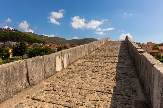 Arslanagica most stone bridge defining journey path, Bosnia and Herzegovina.