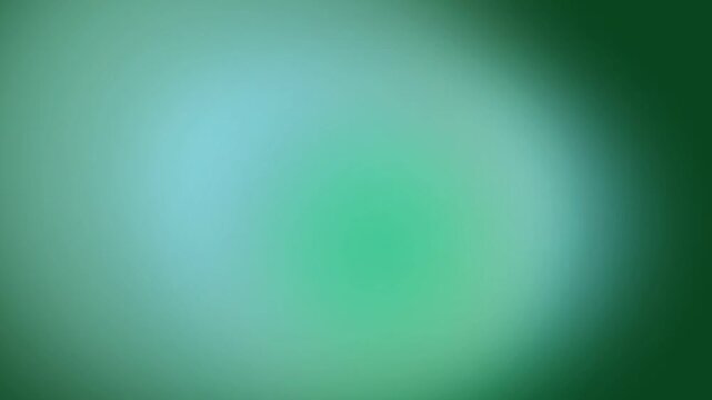 A blurry green gradient oval shape on a dark background from a straight-on viewpoint