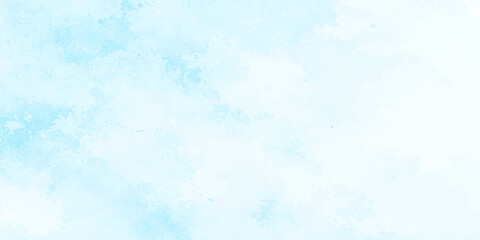Fototapeta premium An abstract blue watercolor background featuring a cold winter sky texture with soft white clouds and ice patterns on vintage grunge paper design