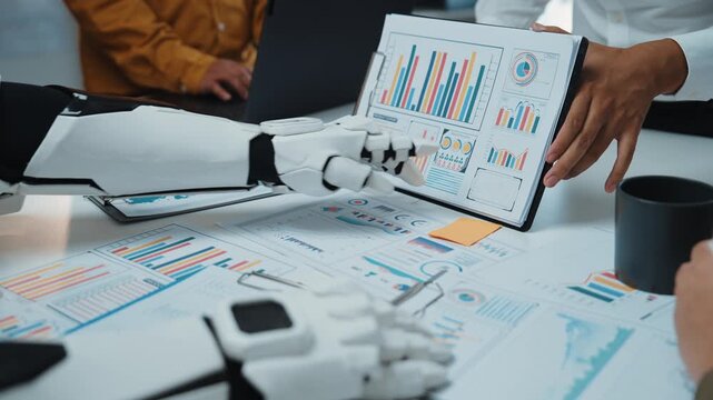 During a progressive team huddle, a consultant taps artificial intelligence for data analytics support, revealing patterns that inform marketing plans and collaboration. Noogenesis AI