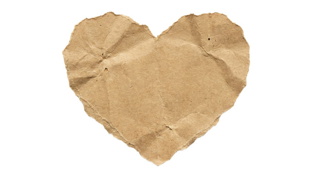 Torn heart shape made of brown crumpled kraft paper with rough jagged edges isolated on a transparent background, concept of handmade love and rustic romance