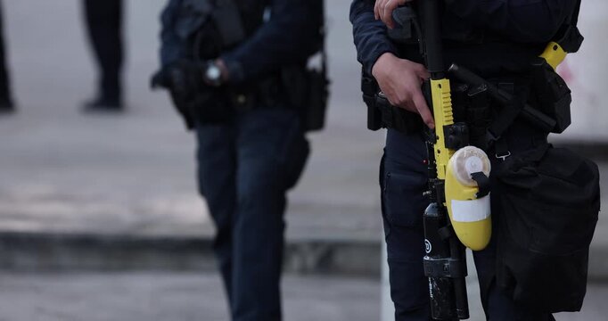 Los Angeles, California, USA - January 31, 2026: DHS Department of Homeland Security police officers protect the downtown Federal building during an anti ICE protest. 