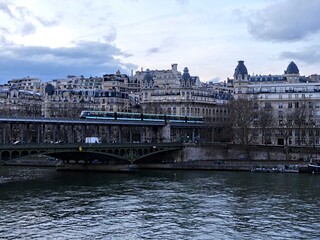 Obraz premium Paris, February 2026: Visit of the magnificent city of Paris, Capital of France - View on different facades of buildings built by Baron Haussmann