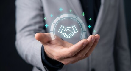 Businessman holding an open palm with a glowing digital handshake icon, representing business partnership, corporate agreement, trust building, successful collaboration.