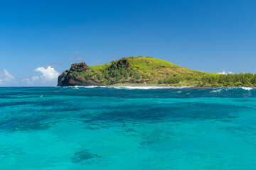 Fototapeta premium Mauritius, Gabriel Island - 18 April 2022 - View of Gabriel Island and the intensely blue sea