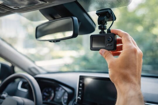 Installing a Dash Cam on a Car Windshield for Safe Driving