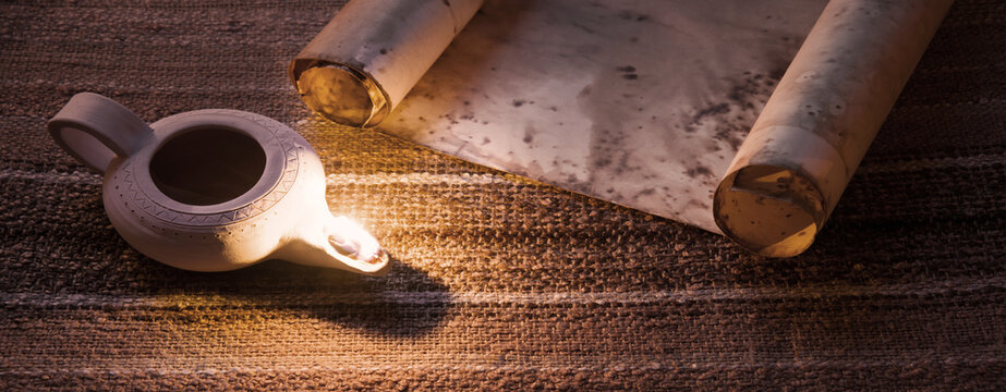 Old oil lamp and scroll