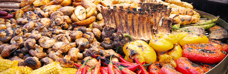 Grilled ribs, meat, potatoes, pepper, mushrooms