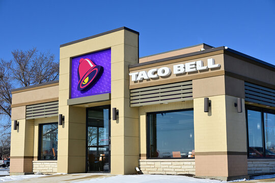 A Taco Bell fast food restarurant positioned within a shopping mall in suburban Chicago. Founded in 1962 by Glen Bell, Taco Bell is now a subsidiary of Yumi Brands, Inc.