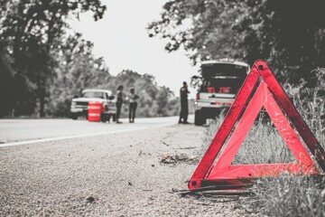 Roadside accident scene with warning triangle