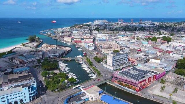 Yachts moored at Careenage (Constitution River) in historic city center of Bridgetown, Barbados. Historic Bridgetown and its Garrison is a UNESCO World Heritage Site.