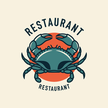 Blue Crab Restaurant Logo with Orange Circle Background.