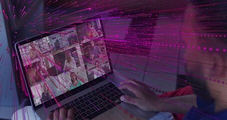 Typing on laptop, hands using trackpad on bed, showing call thumbnails, magenta overlay