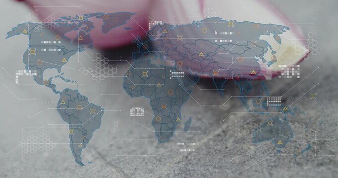 Finger touching and nudging pink petals, petals unfolding and sweeping while HUD showing map data
