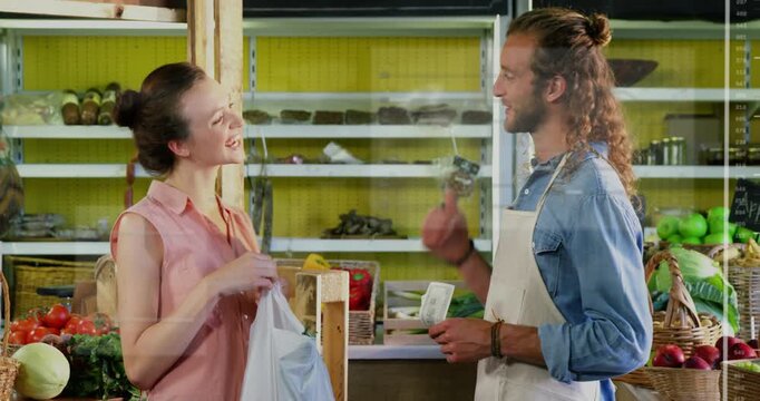 Customer coming to stall, buying apples, paying while clerk handing bag, returning cash