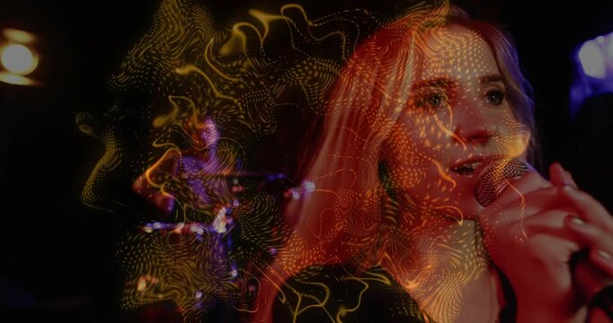 Female singer raising mic and singing, drummer playing, causing golden waveform overlay over stage