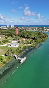 Flying by Jupiter lighthouse at Jupiter Inlet in Palm Beach County, Florida. 