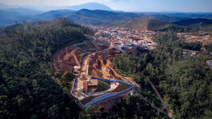 Tree felling and embankment construction process for real estate development in jungle areas © WILL PHOTOGRAPHY