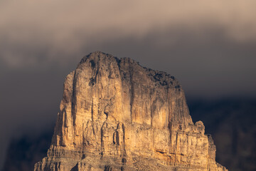 Sun Lit El Capitan Stands Out Against Thick Gray Clouds