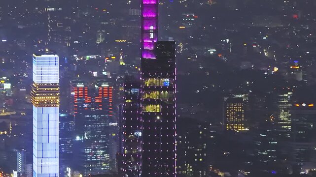 Aerial view night of Ho Chi Minh City skyline and skyscrapers in center of heart business at Ho Chi Minh City downtown. Financial and business centers in developed Vietnam.