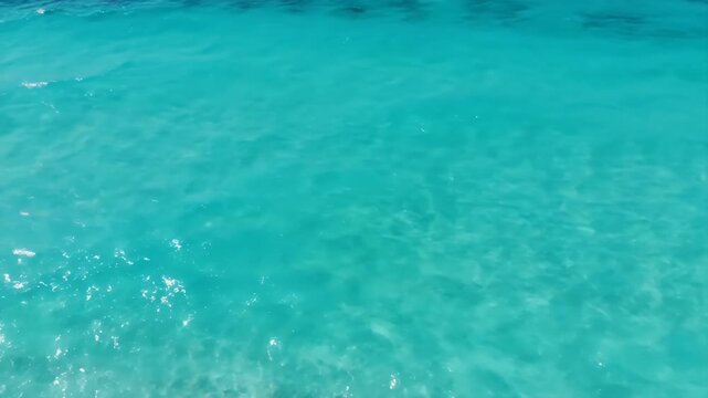 Serene Turquoise Ocean Water Ripples Under Sunlight Abstract Background for Beach Vacation Promotion 190 Character