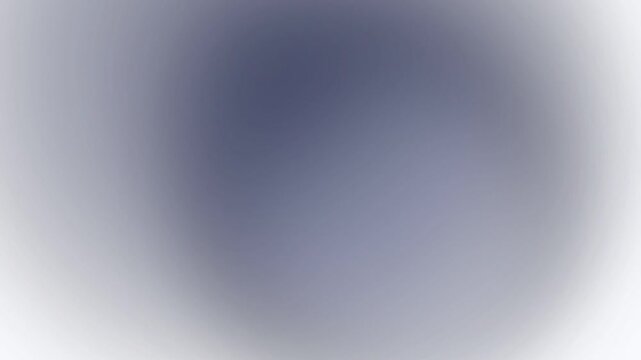 A blurred oval shape with gradient effect on a blurred background