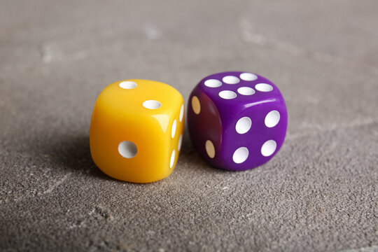 Different dices on grey background