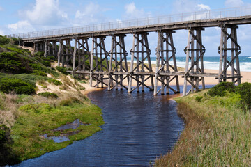 Fototapeta premium The ex-railways wooden trestle Kilcunda Bridge spans 91 metres across Bourne Creek - Kilcunda, Victoria, Australia