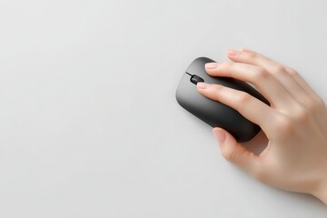 Grasping the Interface: A hand delicately rests on a computer mouse, a symbol of interaction, control, and digital engagement. It represents the interface between person and technology.