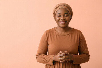 Smiling African Muslim Woman In Brown Hijab Praying During Ramadan